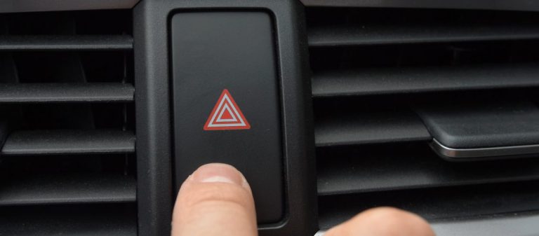 Pressing,Car,Hazard,Emergency,Lights,Button,Close,Up
