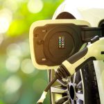 Ev,Car,Or,Electric,Car,At,Charging,Station,With,The