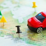Road,Trip,At,Homeland,-,Red,Car,Goes,On,Map