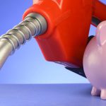 A,Concept,Of,Saving,Money,At,The,Gas,Pumps,Using
