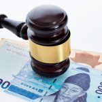 Law,Gavel,On,South,Korea,Money,Against,White,Background.