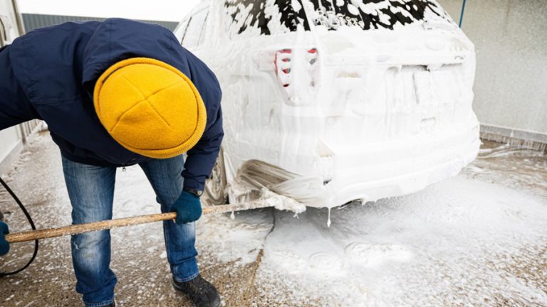 Man,Washing,American,Suv,Car,With,Mop,At,A,Self