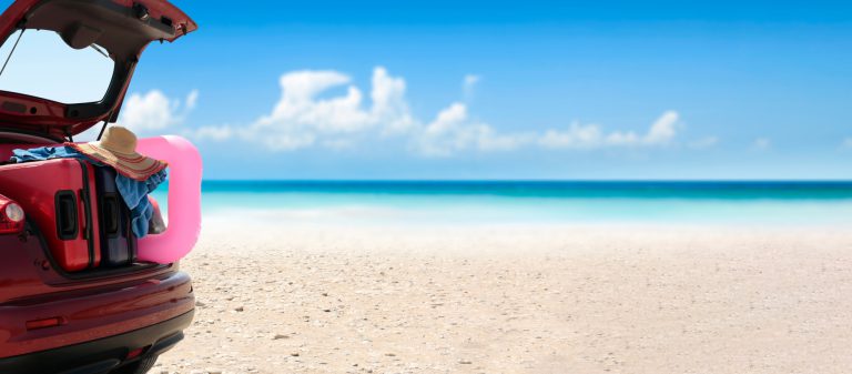 Summer,Car,On,Beach,And,Sunny,Day,.,Free,Space